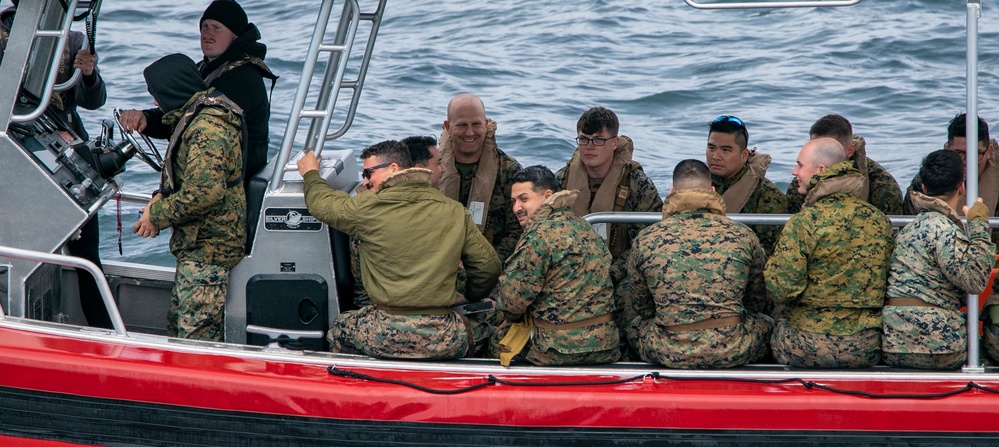 U.S. Marines disembark from the USS Somerset (LPD 25) during QUART 25.2