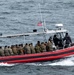 U.S. Marines disembark from the USS Somerset (LPD 25) during QUART 25.2