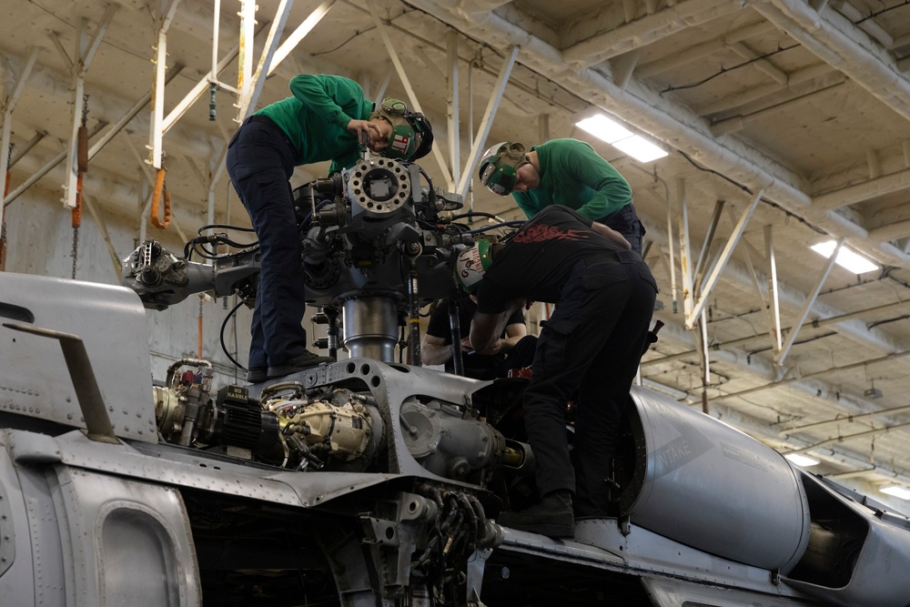 Sailors Conduct Maintenance