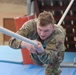 First competitor takes on rope obstacle
