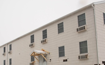 Contractors move World War II-era barracks at Fort McCoy