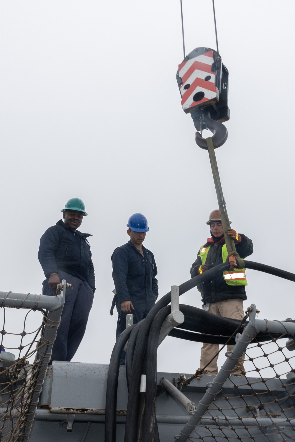 Sailors Disconnect Shore Power