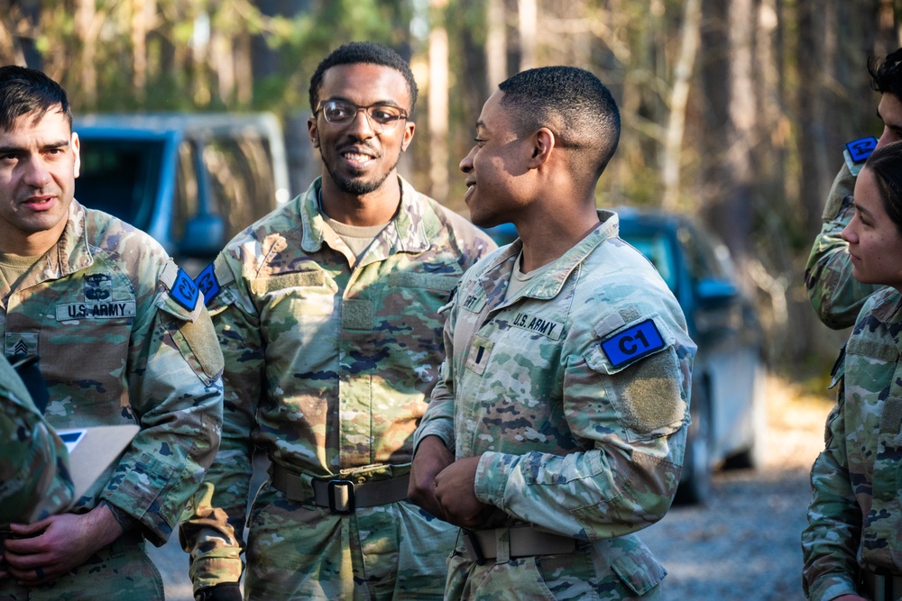 U.S. Soldiers efficiently pass obstacles of a confidence course during MRC competition