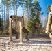 U.S. Soldiers efficiently pass obstacles of a confidence course during MRC competition