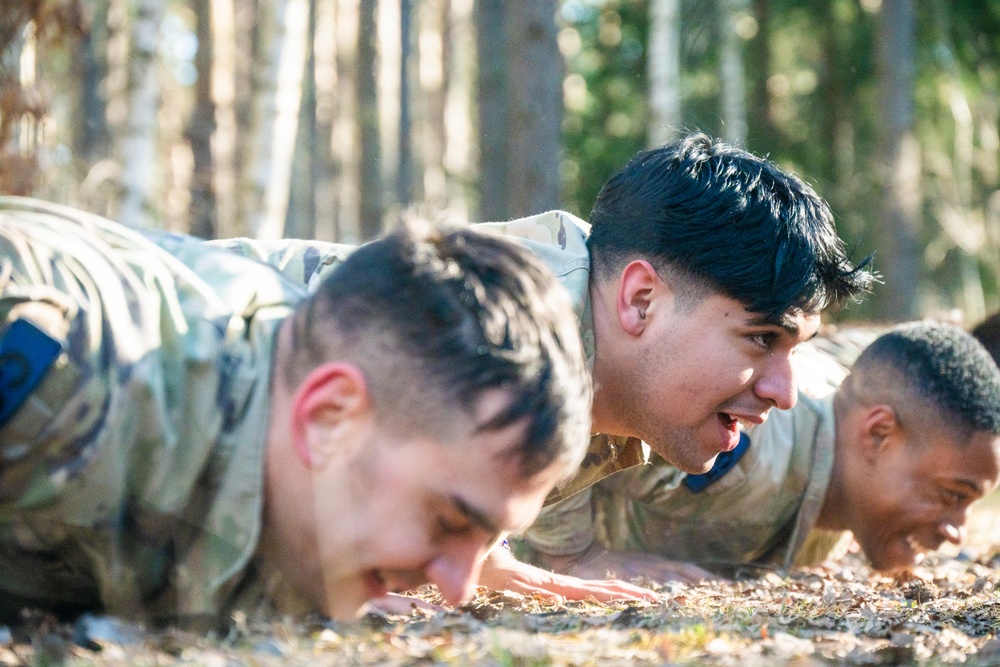 U.S. Soldiers efficiently pass obstacles of a confidence course during MRC competition