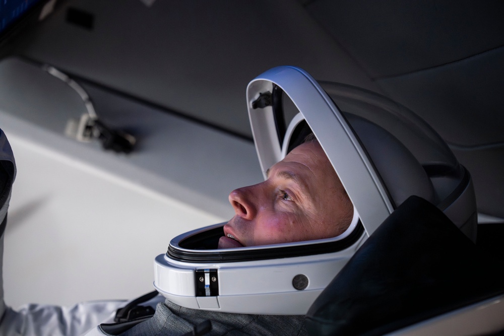 Space Force Guardian trains inside mockup SpaceX Dragon crew vehicle