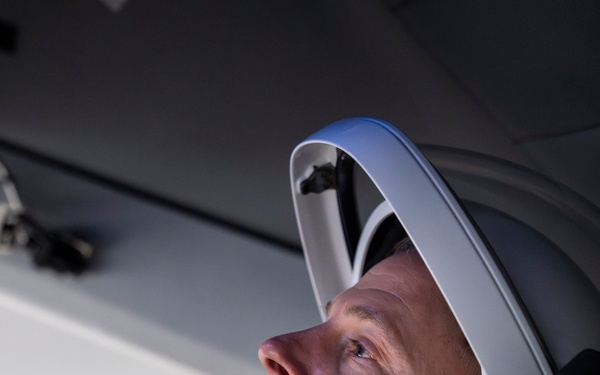 Space Force Guardian trains inside mockup SpaceX Dragon crew vehicle