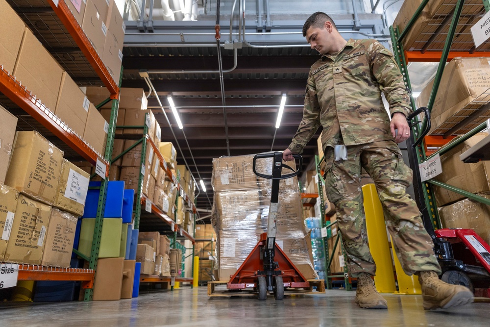 U.S. Soldiers conduct warehouse operations