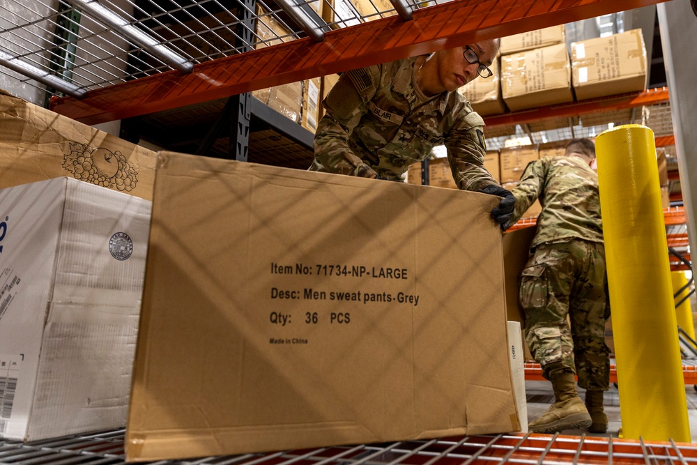 U.S. Soldiers conduct warehouse operations