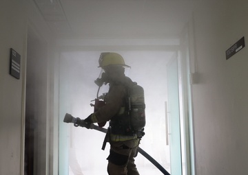 Combined Team Combats Simulated Explosion on Camp Carroll