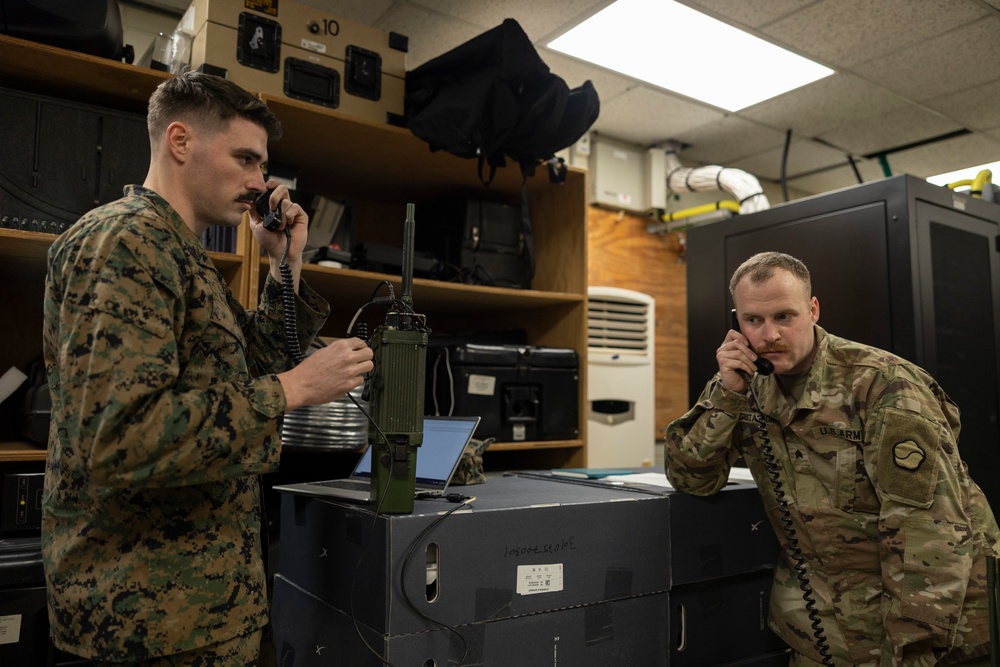 U.S. Marines with CLR-37 and U.S. Army Soldiers with 19th ESC Conduct Communications Training