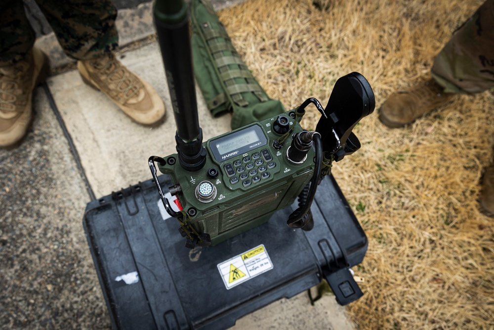 U.S. Marines with CLR-37 and U.S. Army Soldiers with 19th ESC Conduct Communications Training