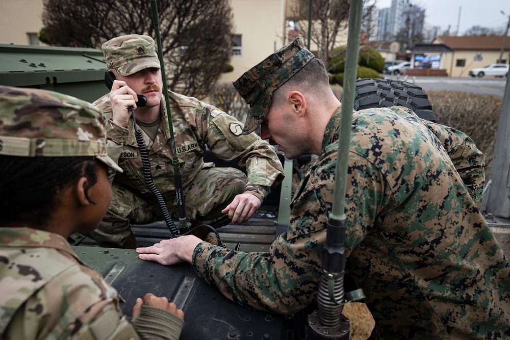 U.S. Marines with CLR-37 and U.S. Army Soldiers with 19th ESC Conduct Communications Training