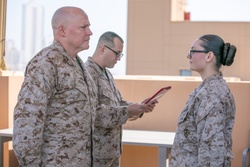 MajGen. Bligh awards a Marine with TF 51/5 with a Navy and Marine Corps Commendation Medal [Image 2 of 7]
