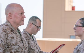 MajGen. Bligh awards a Marine with TF 51/5 with a Navy and Marine Corps Commendation Medal