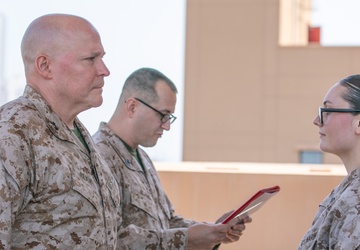 MajGen. Bligh awards a Marine with TF 51/5 with a Navy and Marine Corps Commendation Medal