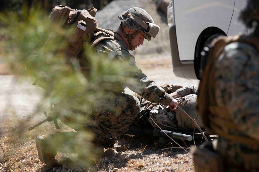Japan-based Marines practice patrolling and vehicle maintenance
