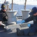 Sailors conduct maintenance abord USS Gravely (DDG 107)