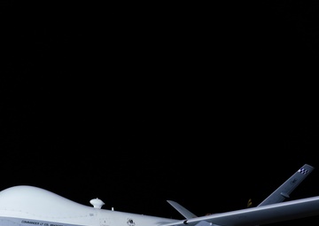 First GBU-39s loaded on MQ-9 Dual-Carriage System