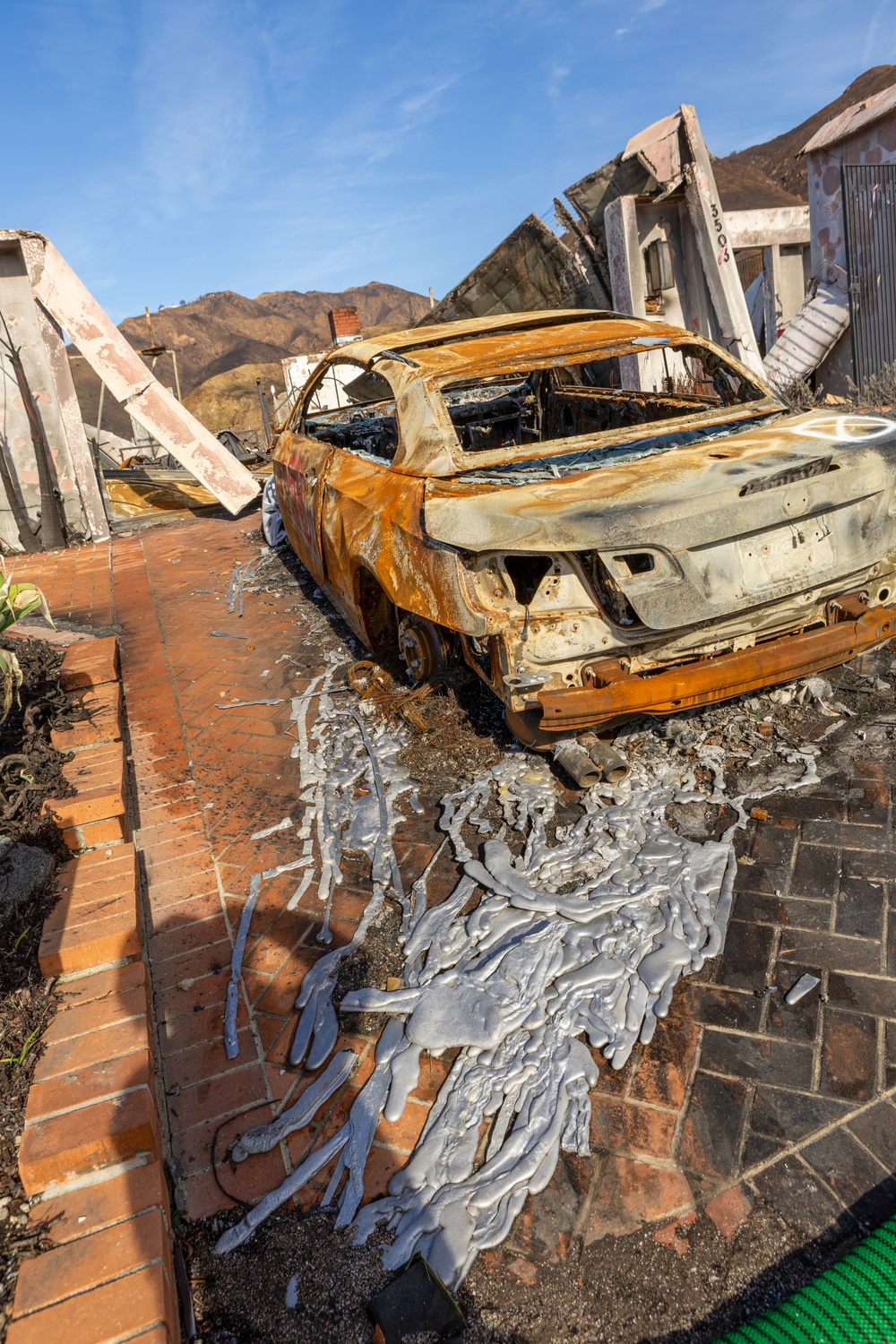 Fire-Damaged Home Awaits Debris Removal