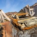 Fire-Damaged Home Awaits Debris Removal