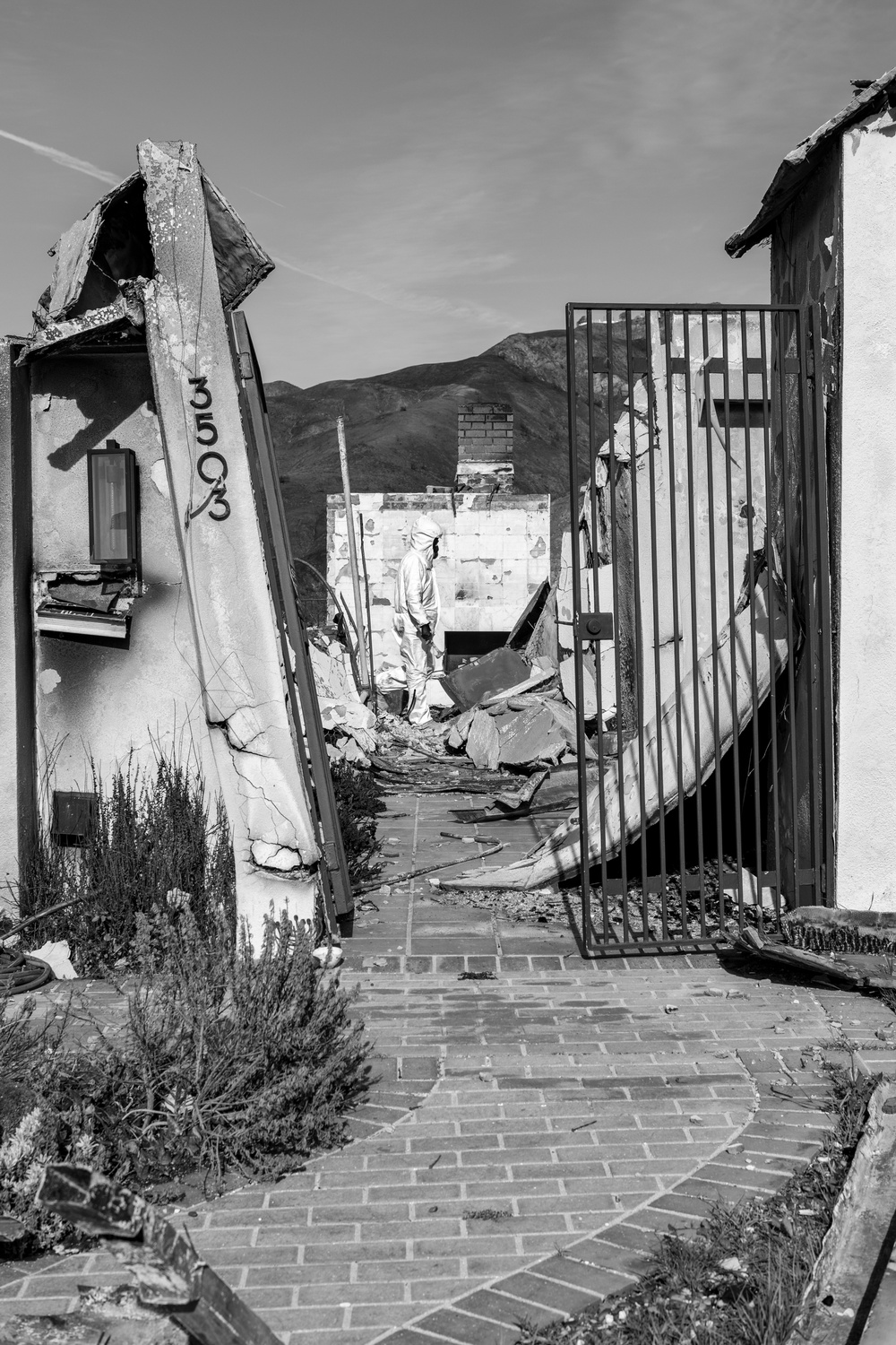 Fire-Damaged Home Awaits Debris Removal