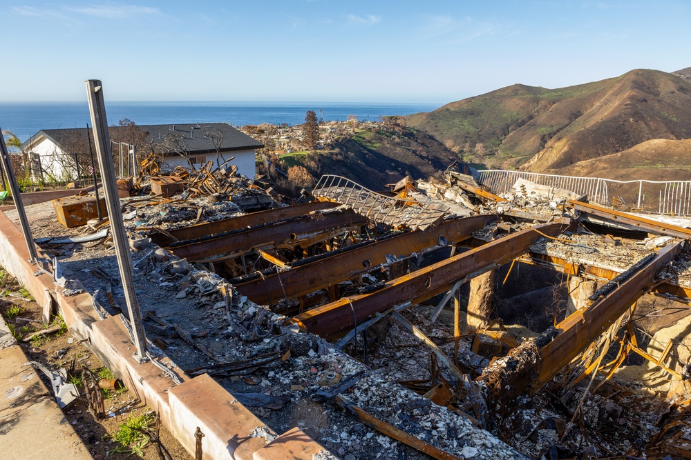 Fire-Damaged Home Awaits Debris Removal