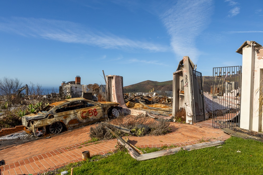 Fire-Damaged Home Awaits Debris Removal
