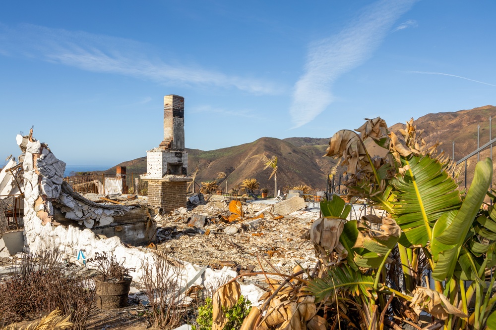 Fire-Damaged Home Awaits Debris Removal