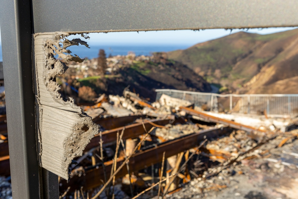 Fire-Damaged Home Awaits Debris Removal