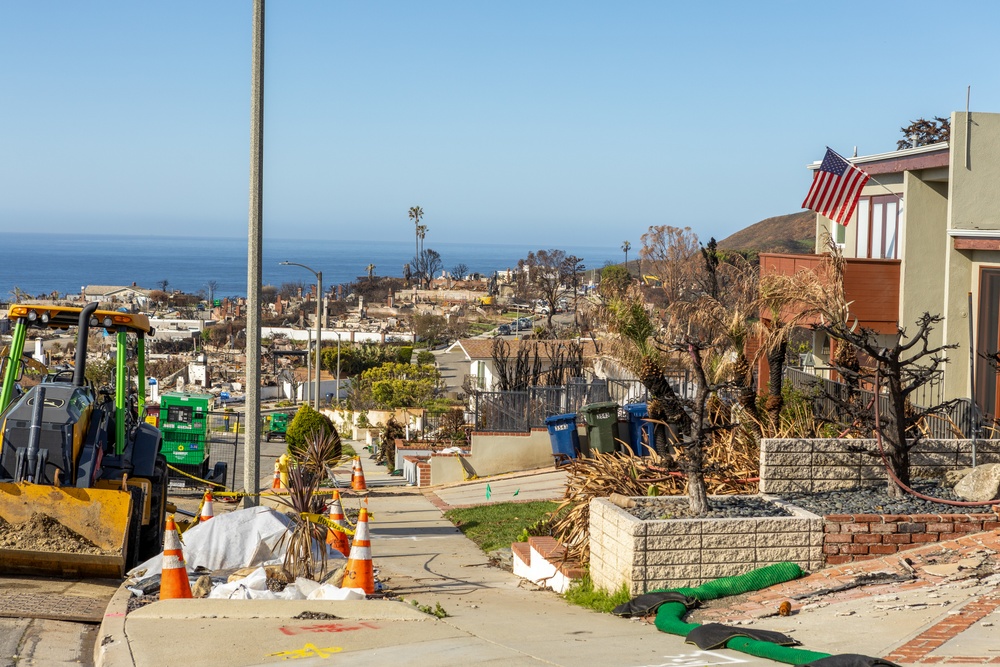 Fire-Damaged Home Awaits Debris Removal