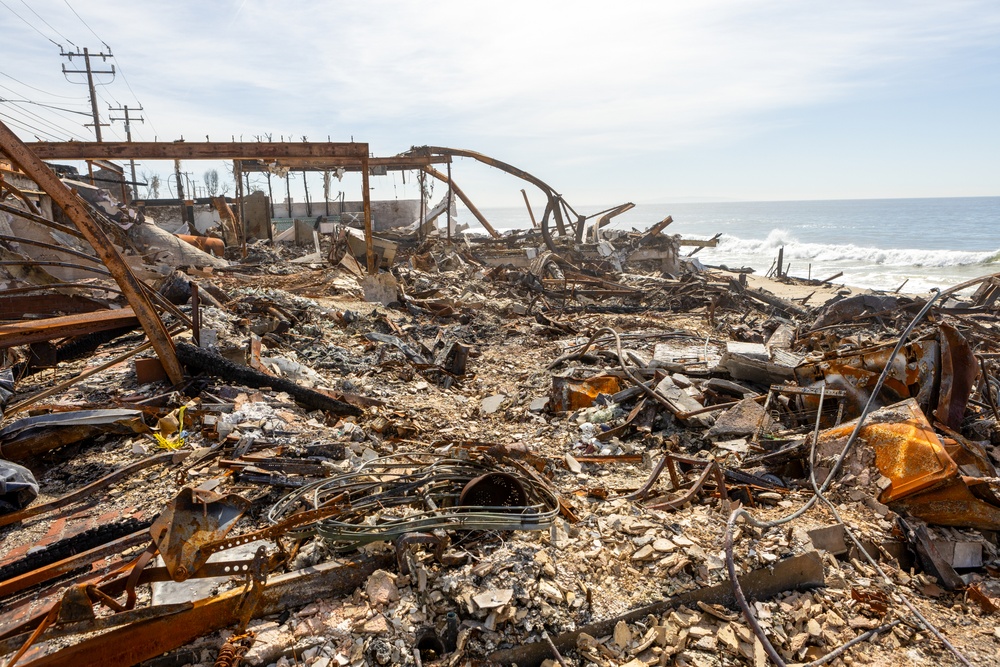 Fire-Damaged Home Awaits Debris Removal