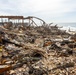 Fire-Damaged Home Awaits Debris Removal