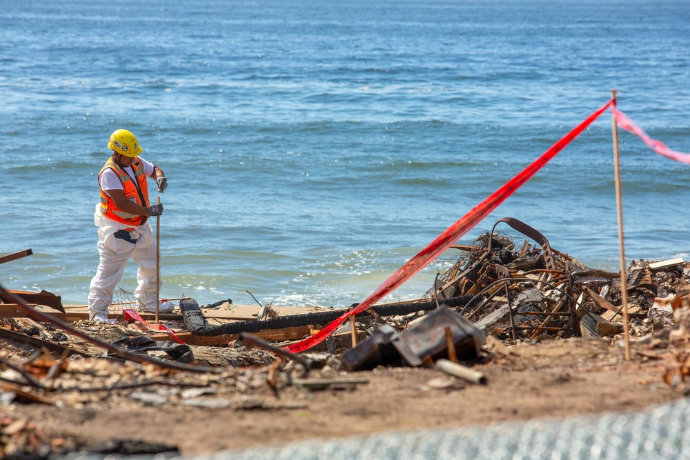 Debris Removal Continues at Fire-Damaged Home