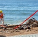Debris Removal Continues at Fire-Damaged Home