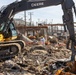 Debris Removal Continues at Fire-Damaged Home