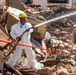 Fire-Damaged Home Awaits Debris Removal