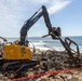 Debris Removal Continues at Fire-Damaged Home