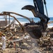Debris Removal Continues at Fire-Damaged Home
