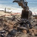 Debris Removal Continues at Fire-Damaged Home