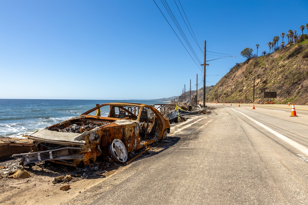 Fire-Damaged Home Awaits Debris Removal