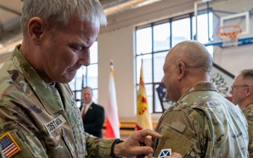 V Corps on the shoulder, USAG Poland celebrates growth during patching ceremony, birthday