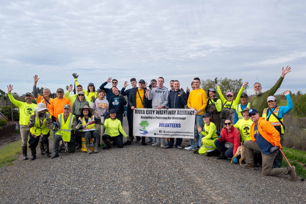 Sailors volunteer with the River City Waterway Alliance