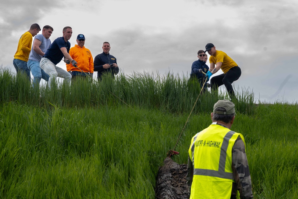 Sailors volunteer with the River City Waterway Alliance