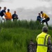 Sailors volunteer with the River City Waterway Alliance