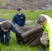 Sailors volunteer with the River City Waterway Alliance