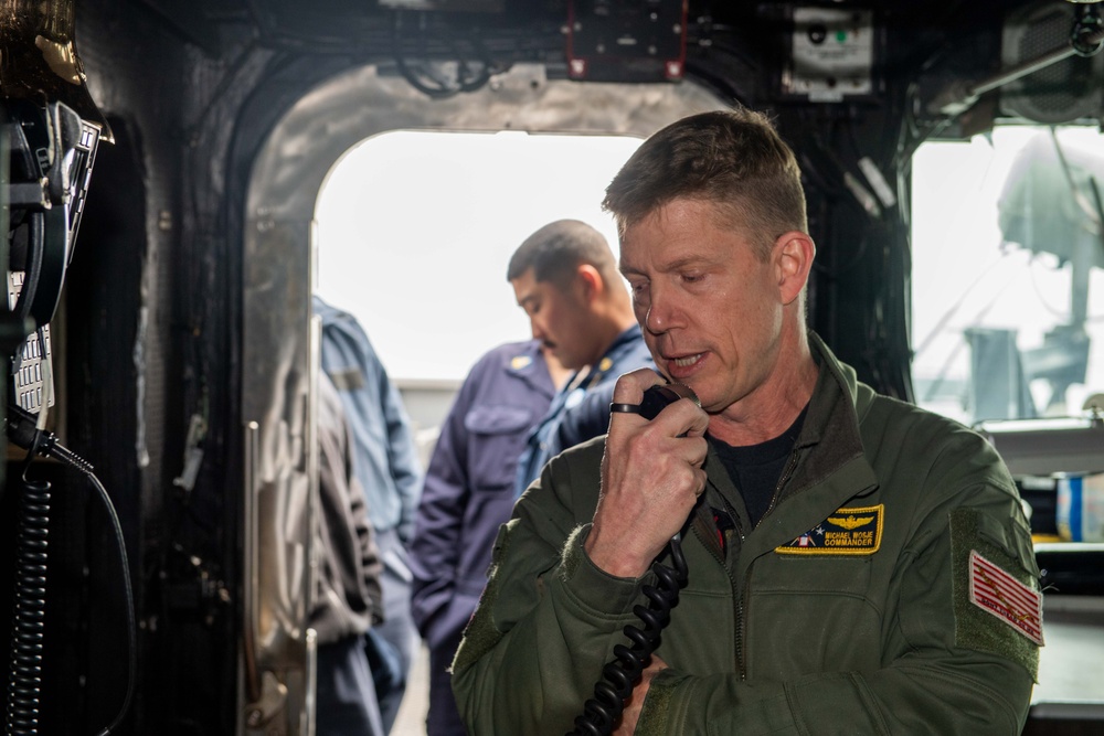 Commander of Carrier Strike Group ONE visits USS Ralph Johnson (DDG 114)