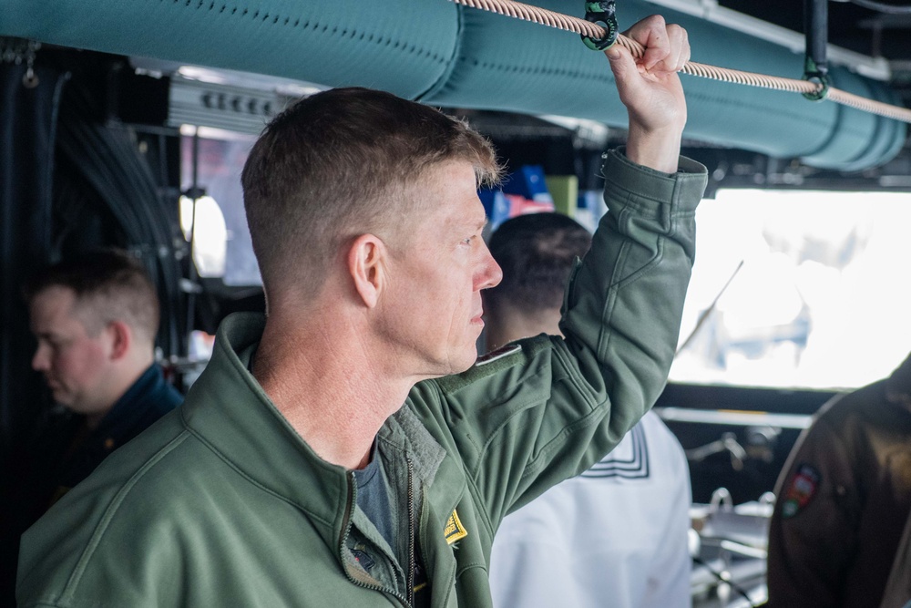 Commander of Carrier Strike Group ONE visits USS Ralph Johnson (DDG 114)