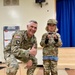 Col. Brian D. Sawser visits with Palisades Elementary School families during a townhall meeting