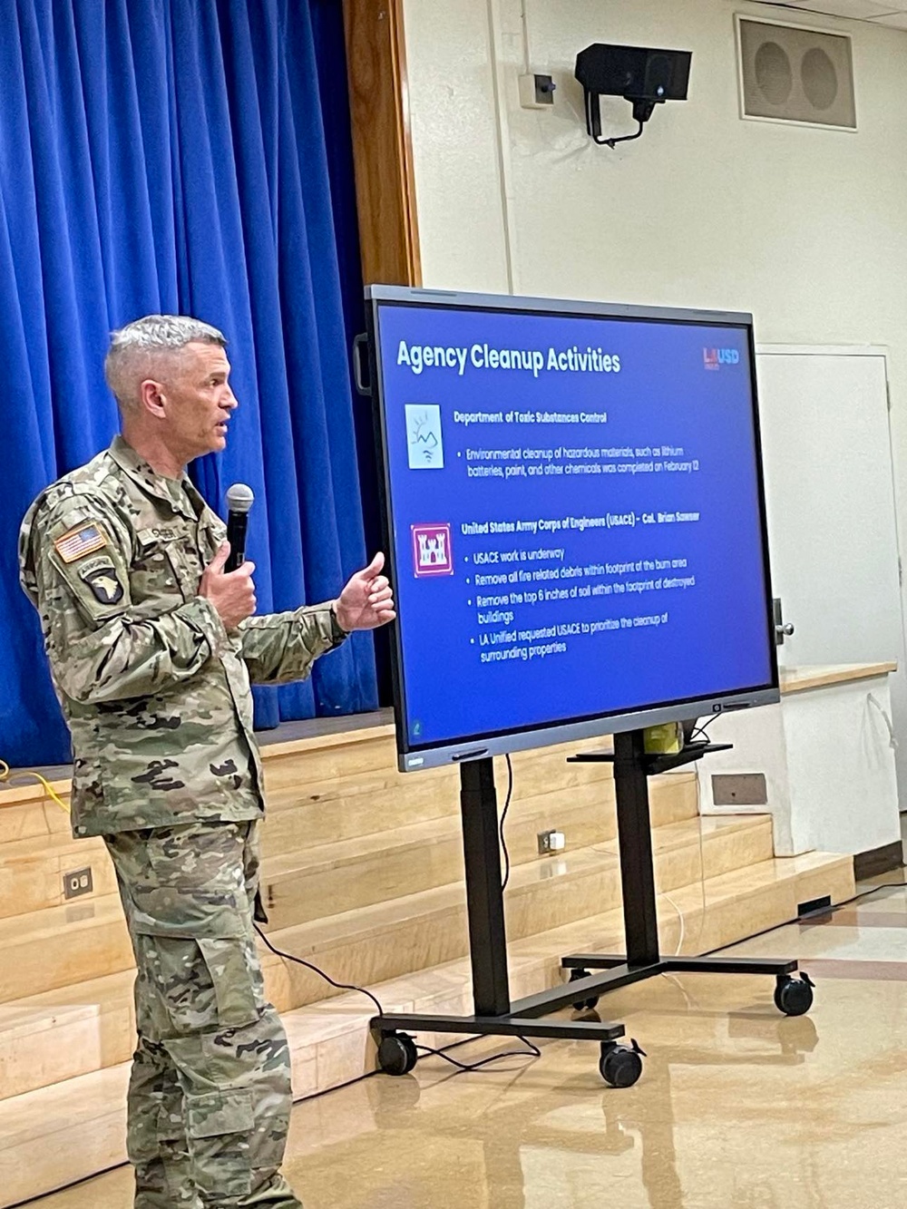 Col. Brian D. Sawser visits with Palisades Elementary School families during a townhall meeting